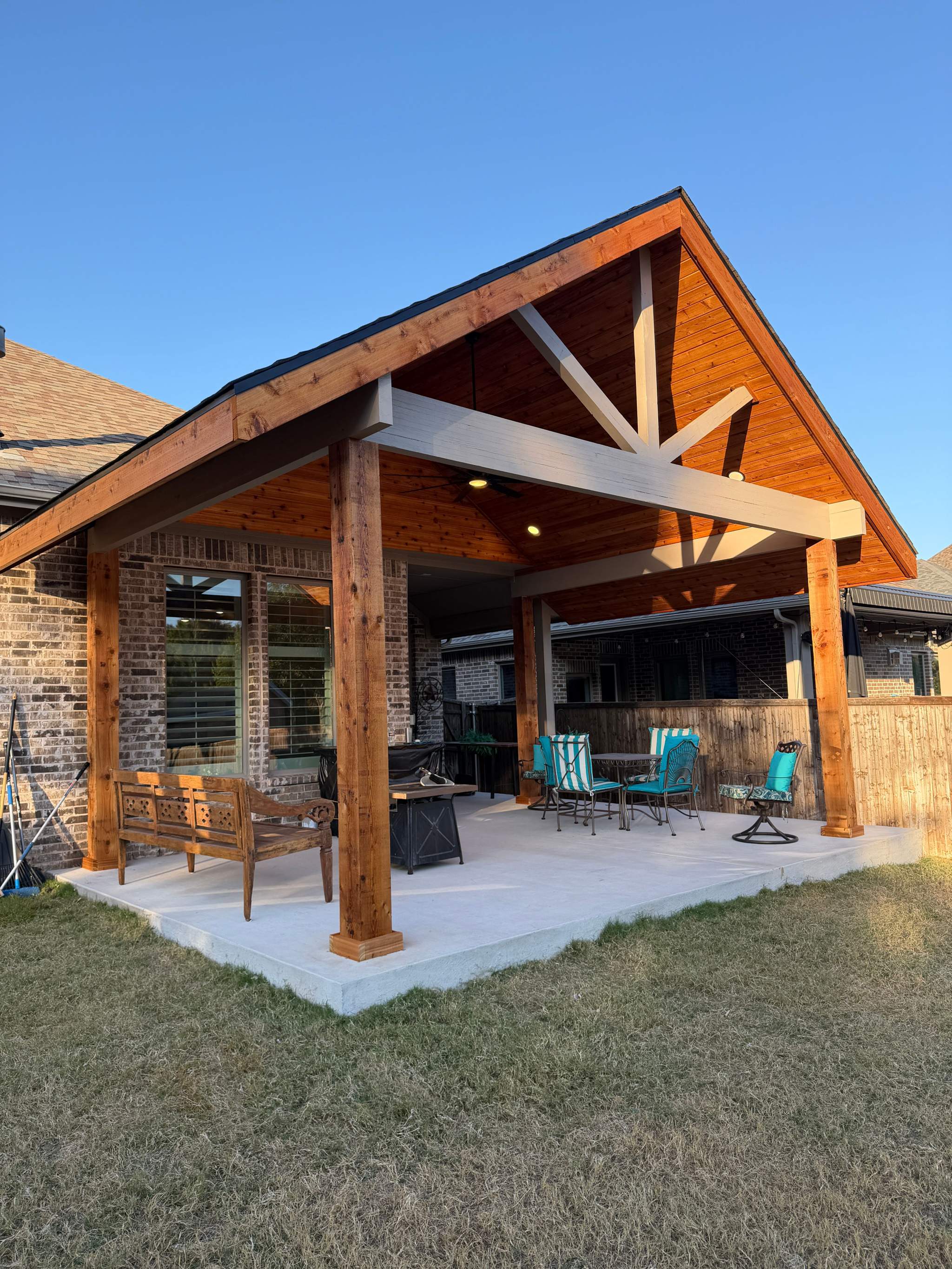 Classic gable patio cover with cedar posts in McKinney Texas