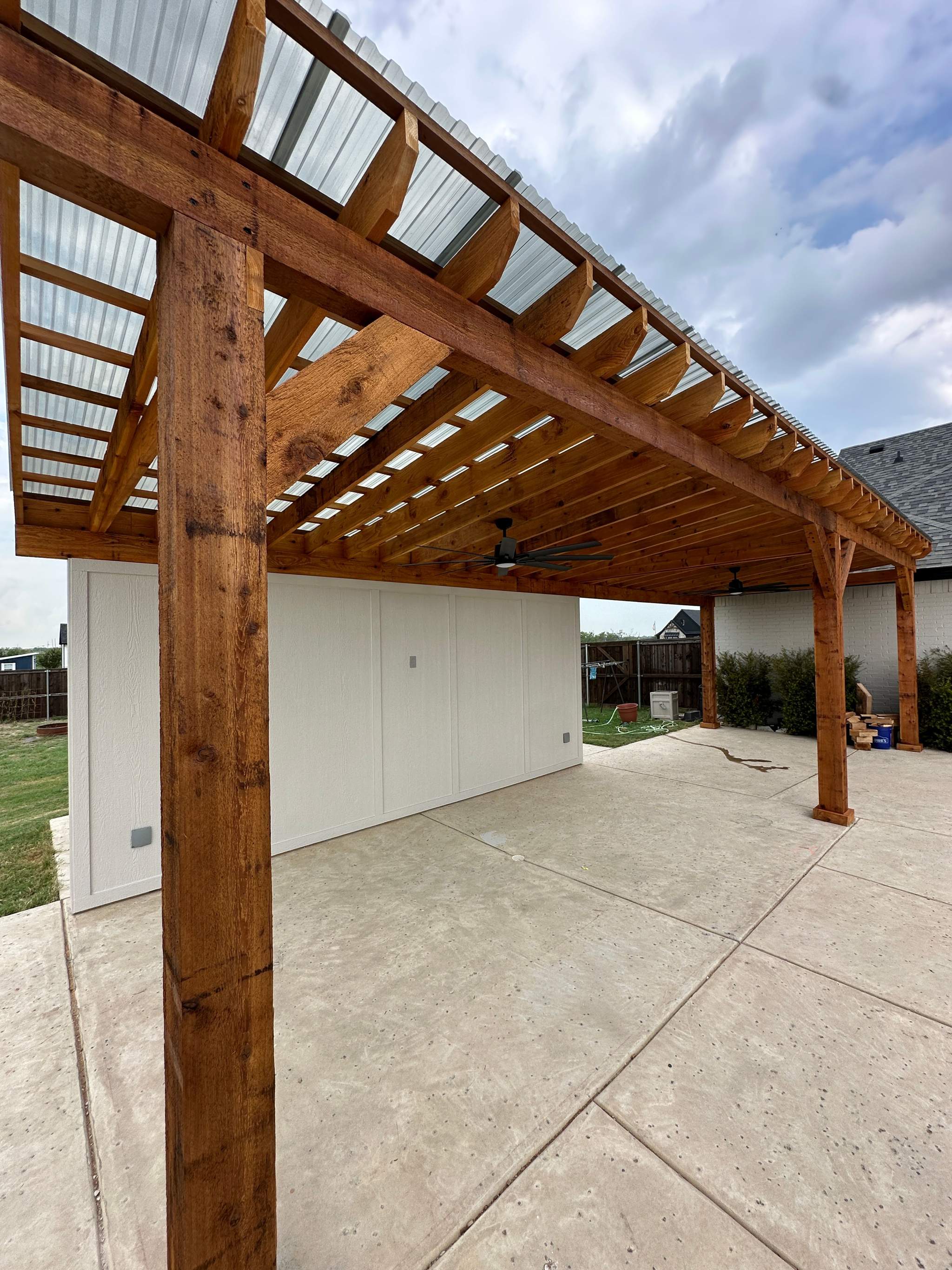 Beautiful patio cover illuminated at night in Fort Worth Texas