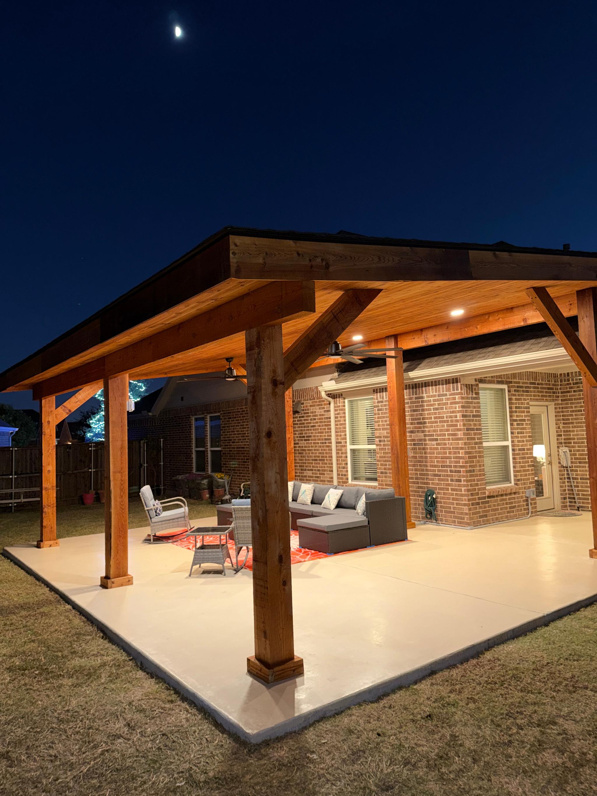 Custom gable patio cover with cedar posts installed in Dallas-Fort Worth by Structure1 Construction