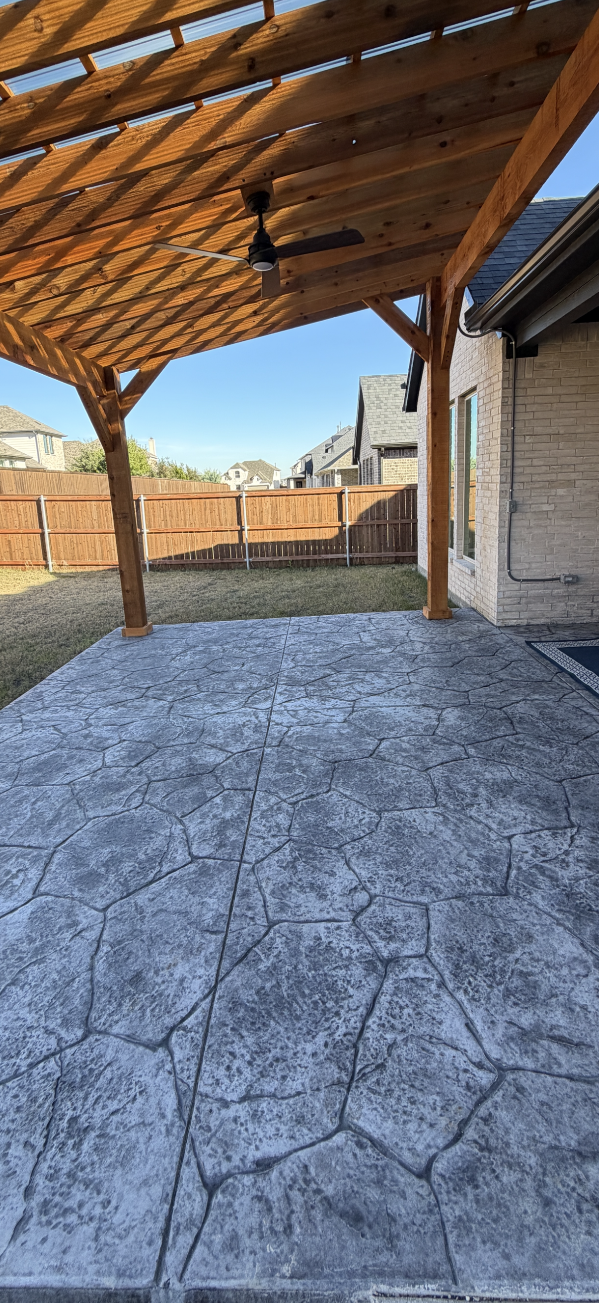 Stamped concrete patio with stone pattern
