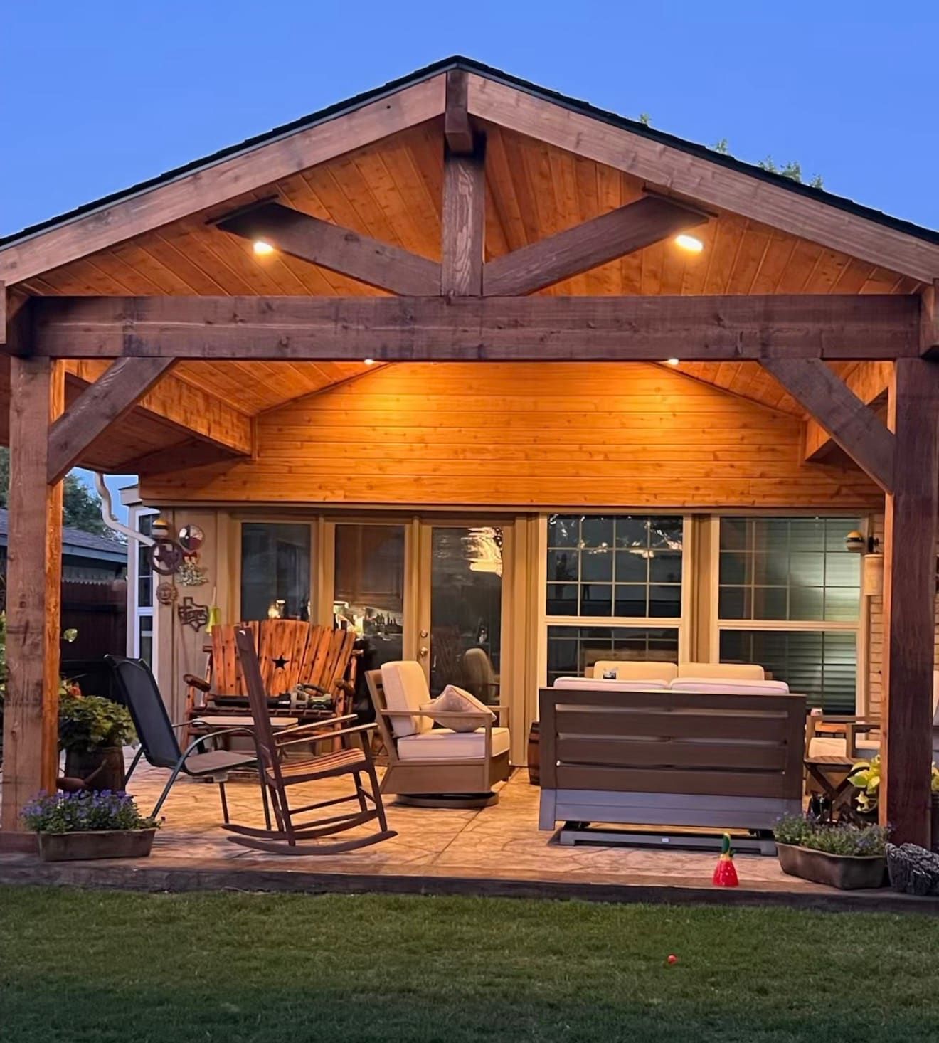 Cedar gable patio cover at dusk in Dallas-Fort Worth